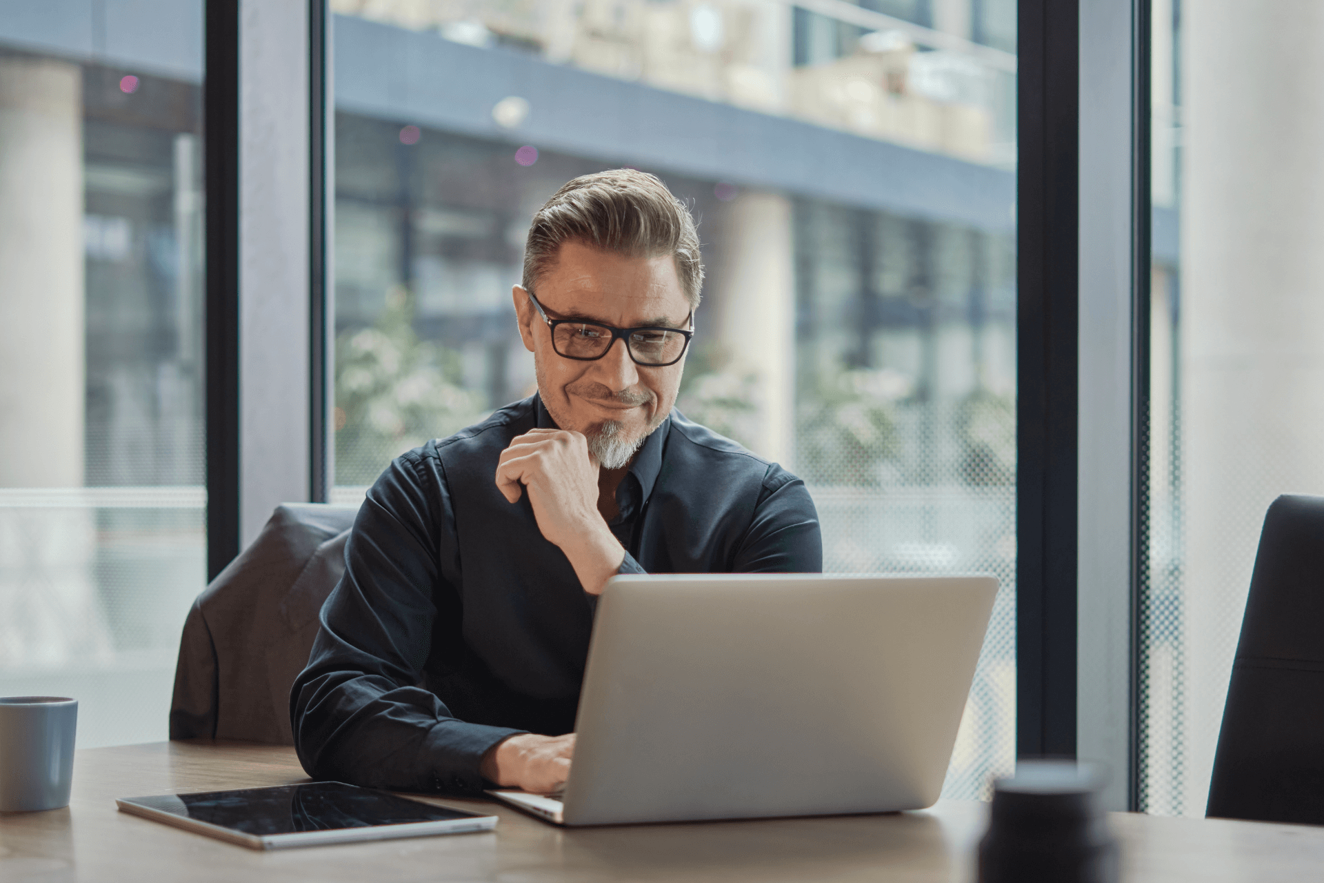 Business man looking at a computer